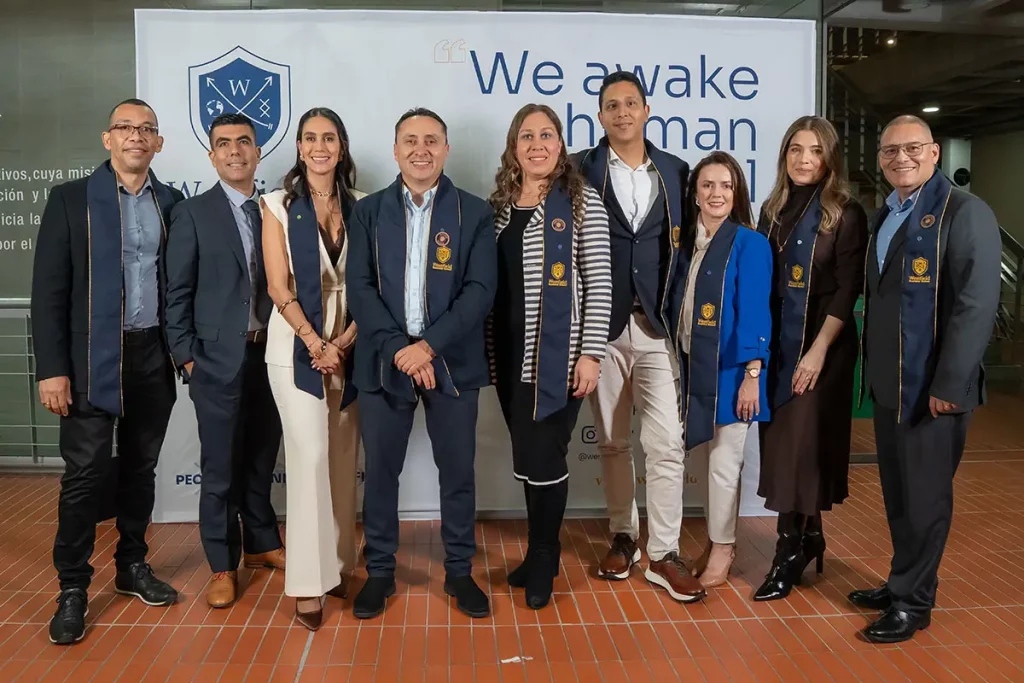 Faculty and graduates celebrating Cohort 63 completion at Westfield Business School